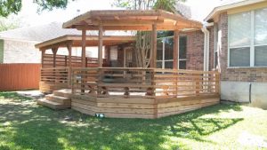 full deck, roof, and arbor, privacy fence, modern handrail,