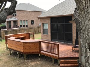 2x6 Western Red Cedar, 3 Coats of Cetol 1. Built in Benches, 2x6 WRC top cap with Aluminum Balusters.